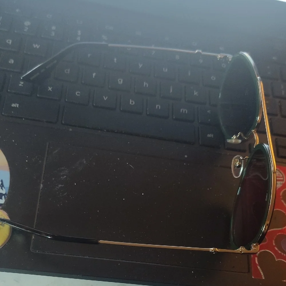 Gucci Sunglasses with Green and Red Accents